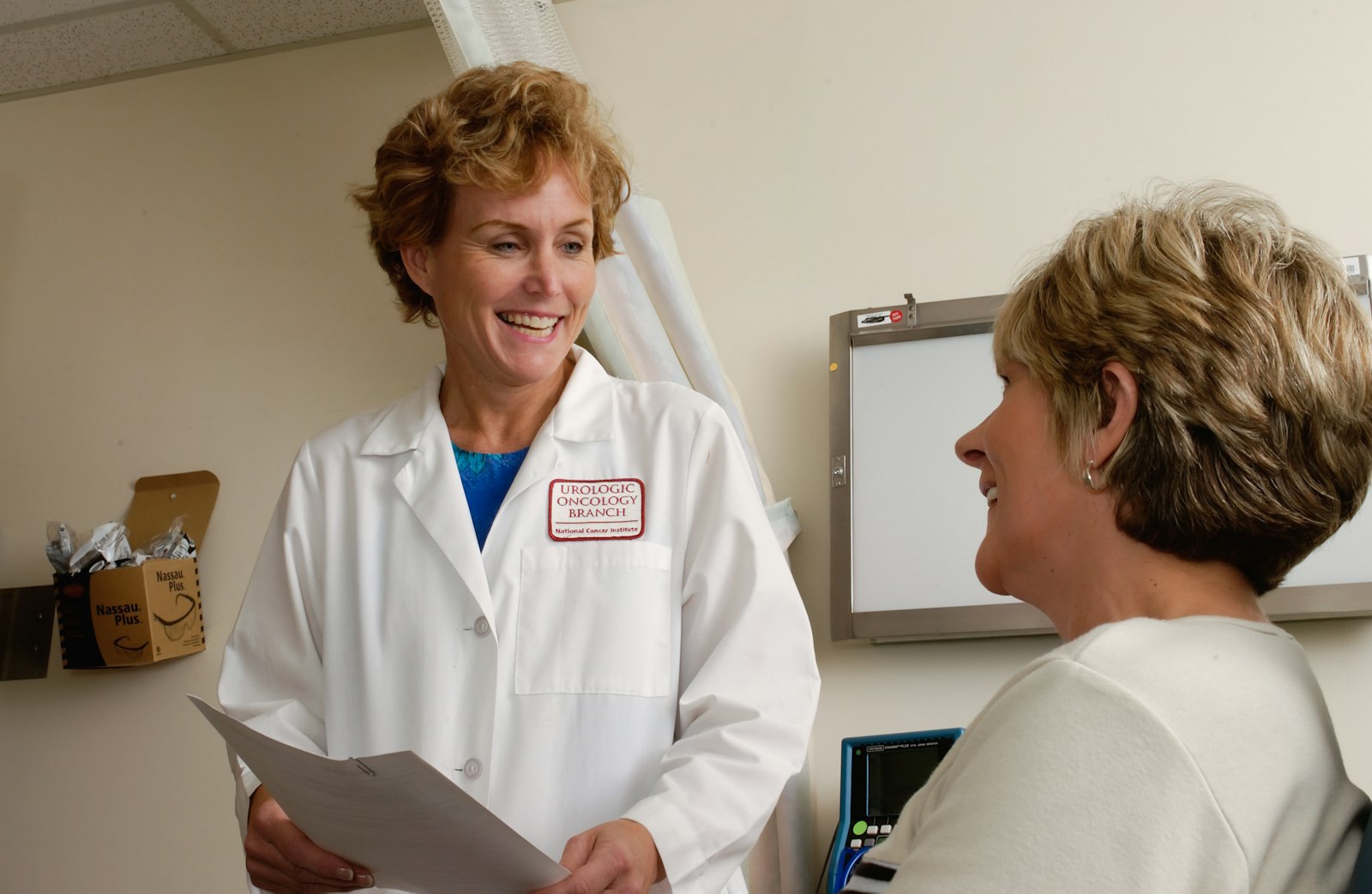 Mature woman discussing long-term health with her physician